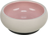 Rosa und beige Schale mit glatter Oberfläche und abgerundeten Kanten.