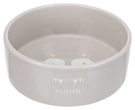 Graue, runde Schüssel mit Katzenmotiv innen und "WELCOME"-Schriftzug außen.