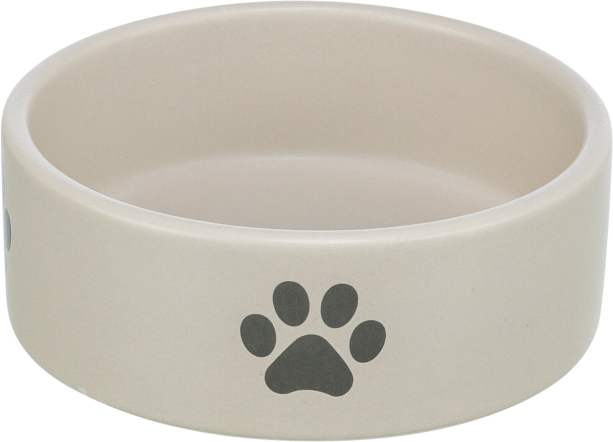 Beiger runder Napf mit schwarzem Pfotenabdruck auf der Außenseite.