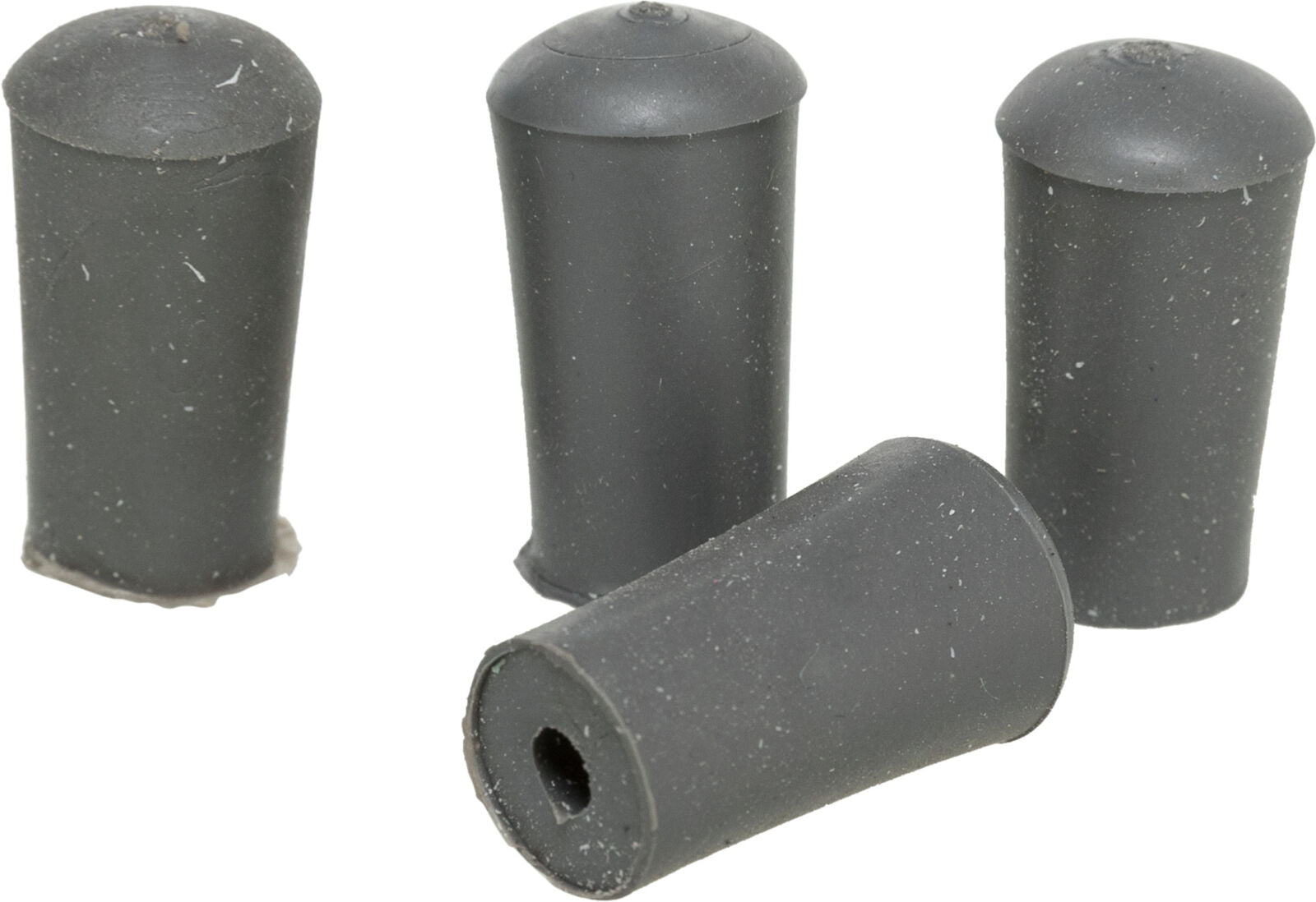 Vier graue zylindrische Objekte mit abgerundeten Kappen sind auf einem hellen Hintergrund angeordnet.