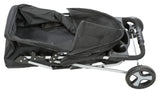 Zusammengeklappter schwarzer Fahrradanhänger mit schwarzen und silbernen Metallrahmen und zwei Rädern.