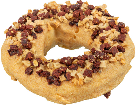 Runder Donut mit braunen und beigen Krümeln bestreut, helle Teigfarbe gut sichtbar.