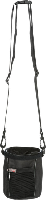 Schwarze Tasche mit verstellbarem Schultergurt, Reißverschluss und Netzfach, Text "TRIXIE" sichtbar.