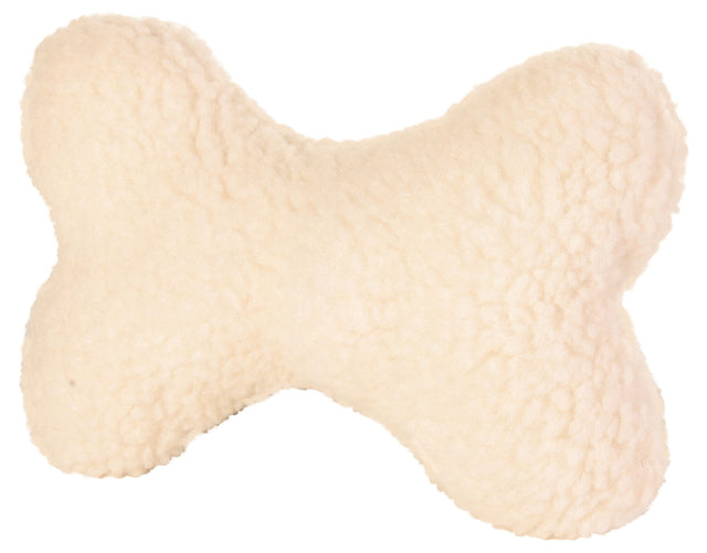 Knochenförmiges, cremefarbenes Kissen mit flauschiger Oberfläche.