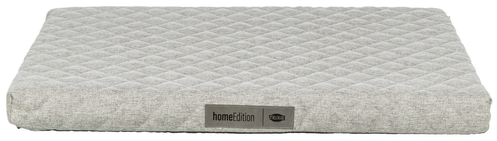 Graues, rechteckiges Polster mit rautenförmigem Muster, Label „homeEdition TRIXIE“ vorne sichtbar.