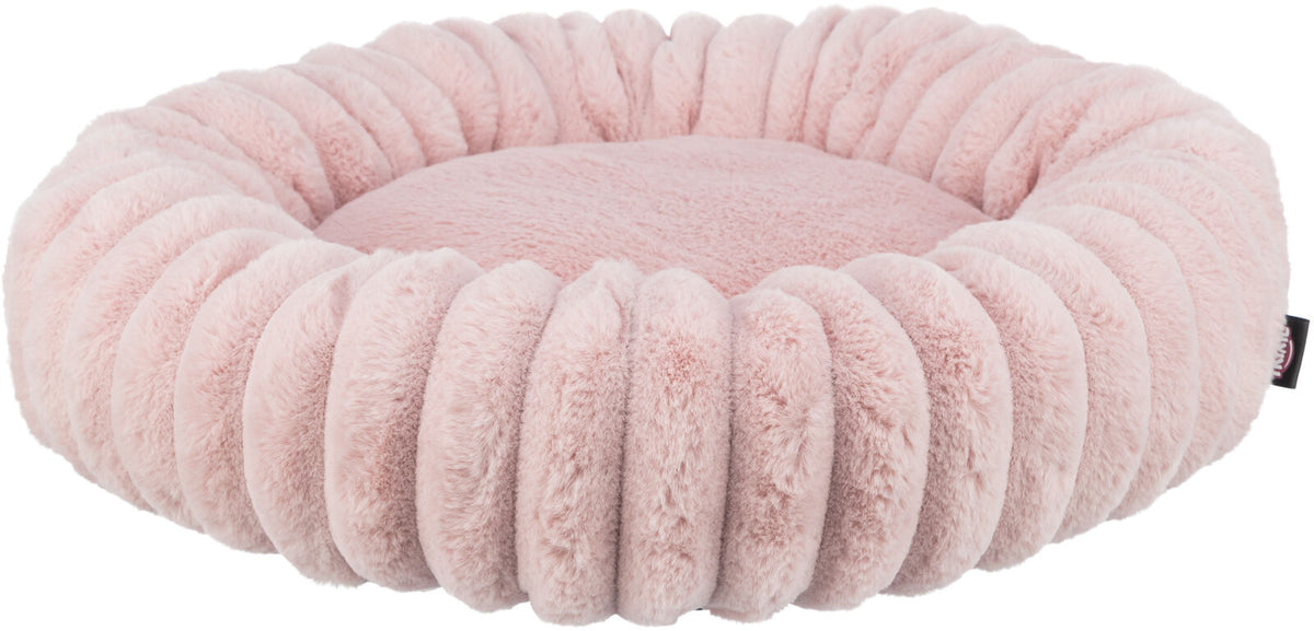 Rundes, flauschiges, rosa Kissen mit geriffeltem Rand.