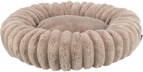 Rundes, beige-farbenes, plüschiges Kissen mit gerippter Struktur und weicher Oberfläche.