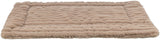 Beigefarbige, flauschige rechteckige Matte mit wellenförmiger Struktur auf der Oberfläche.