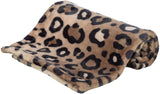 Beigefarbene Decke mit schwarzem Leopardenmuster, weich und flauschig, teilweise aufgerollt.