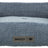 Rechteckiges, blaues Hundebett mit Kissen, gemustertem Stoff und "homeEdition" sowie "TRIXIE"-Logo.