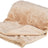 Beige Decke mit aufgedruckten Pfotenmustern, teilweise aufgerollt, weiches Material.