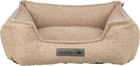 Beiges Hundebett mit strukturierter Oberfläche, rechteckiger Form und einem Schild mit der Aufschrift "homeEdition TRIXIE".