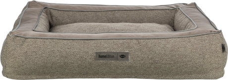 Rechteckiges Hunde- oder Katzenbett aus grauem Stoff mit erhöhten Seiten und Etikettenaufdruck "homeEdition, TRIXIE".
