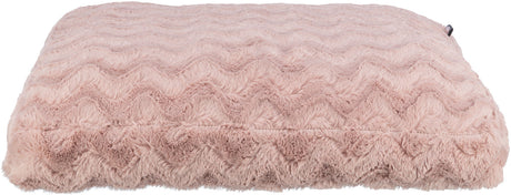 Rechteckiges, rosafarbenes Kissen mit weicher Felltextur und wellenförmigem Muster, seitlich eine kleine Schlaufe.
