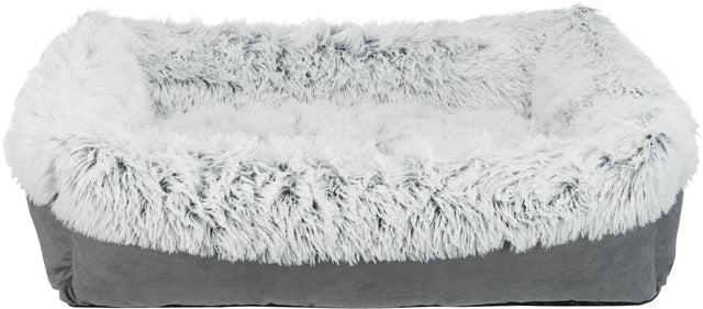 Weiches, rechteckiges Tierbett mit flauschigem, grauem Fellbezug und erhöhtem Rand.