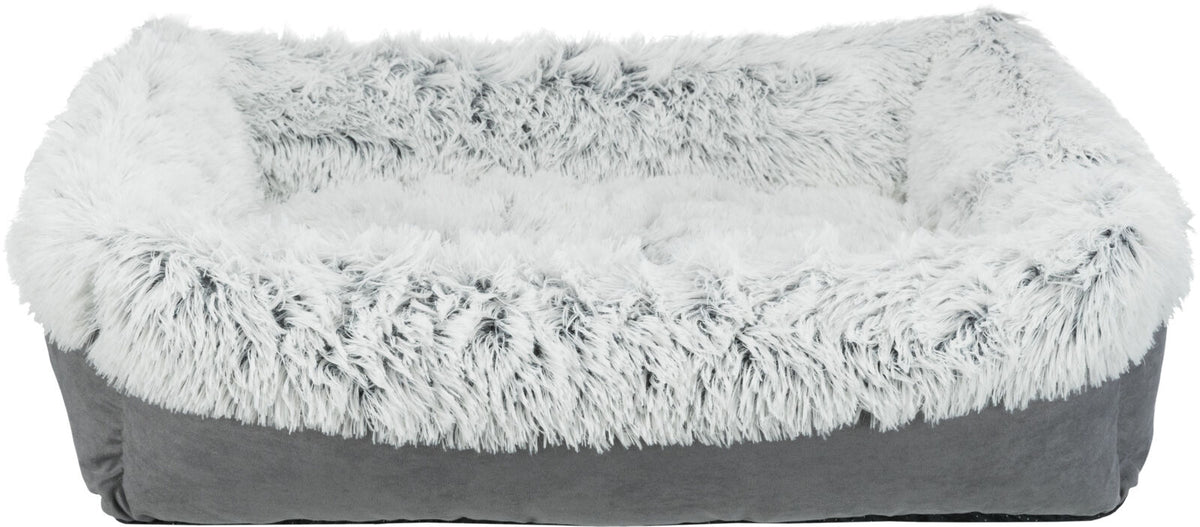 Weiches, rechteckiges Tierbett mit flauschigem, grauem Fellbezug und erhöhtem Rand.