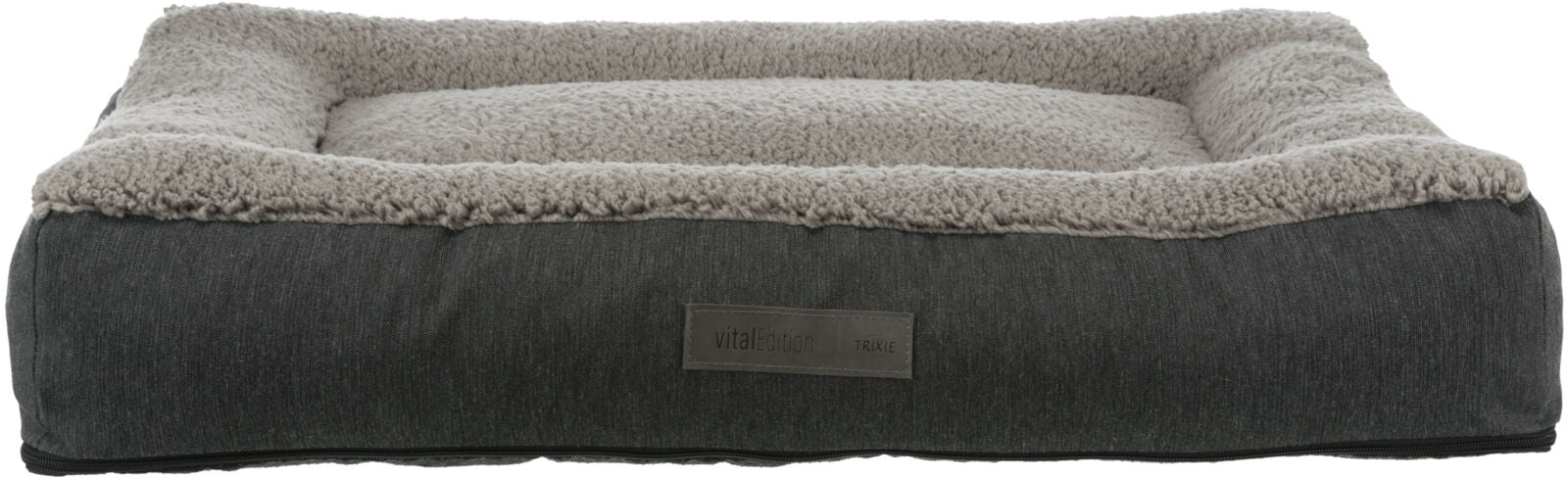 Rechteckiges Hundebett mit grauem Stoffbezug und flauschiger, heller Liegefläche, Label „vital Edition“.