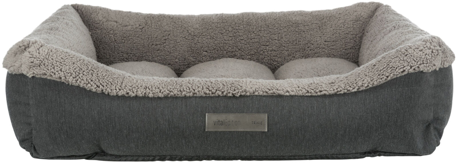 Graues Haustierbett mit weichem, hellgrauem Innenfutter und rechteckiger Form, Label "vital Edition TRIXIE" an der Seite.