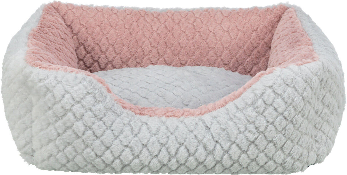 Rechteckiges flauschiges Bett in Grau und Rosa mit einer strukturierten Oberfläche innen und außen.