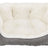 Graues, gestreiftes Tierbett mit weichem, weißem, plüschigem Innenfutter.