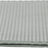Rechteckige, graue Matte mit wabenförmiger Oberfläche und einem grauen Rand aus Textilstoff.