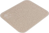 Rechteckige beige Matte mit strukturierter Oberfläche und einer Pfotenabdruckprägung in der Ecke.