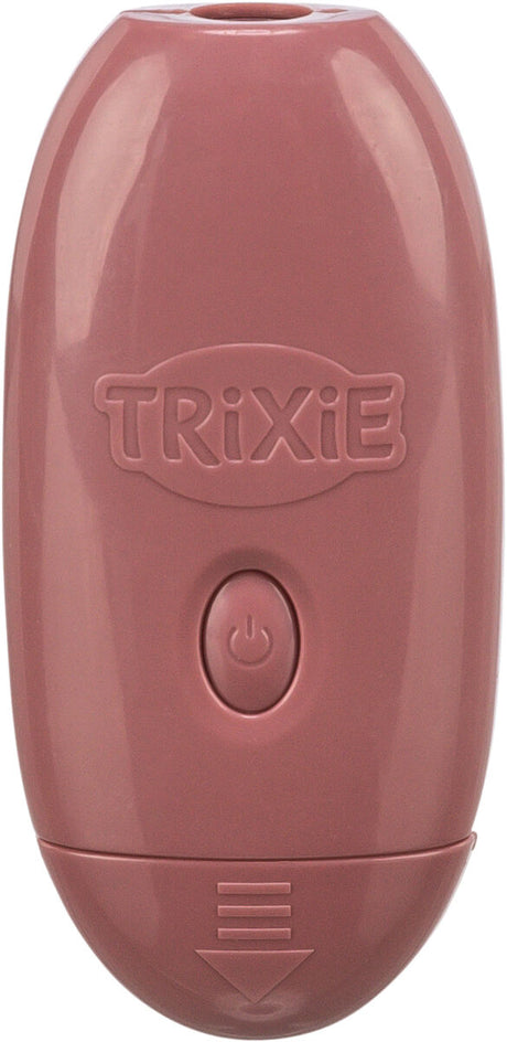 Rosafarbenes, ovales Gerät mit einem Knopf und der Aufschrift "TRIXIE" auf der Vorderseite.