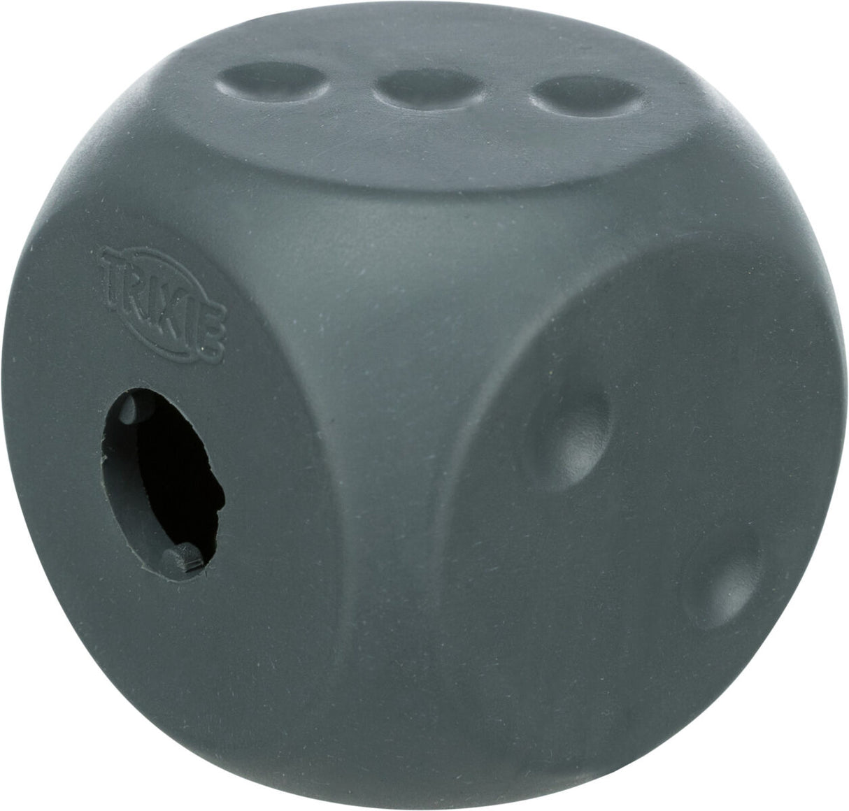 Ein grauer, hohler Würfel mit runden Vertiefungen und einem Loch an einer Seite, Markenname "TRIXIE" sichtbar.