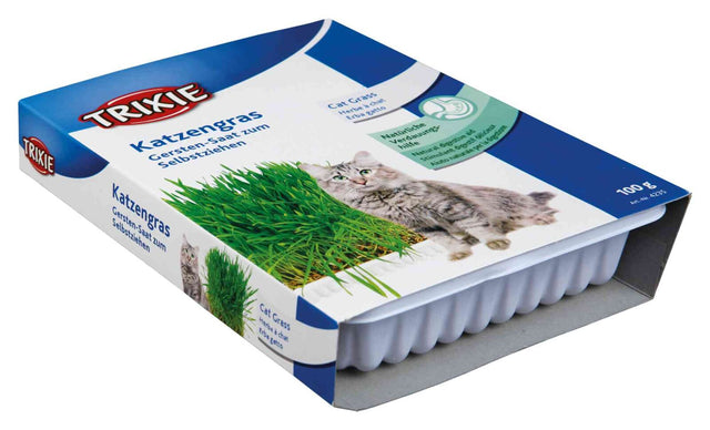 Katzengras-Packung mit grünem Grassprossen-Bild und Katze, Text "Trixie Katzengras, Gersten-Saat zum Selbstziehen".