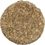 Runde, flache Scheibe aus grobem, gemahlenem Pflanzenmaterial in verschiedenen Brauntönen.