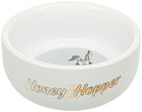 Weiße Schale mit der Aufschrift "Honey &amp; Hopper" und einem Kaninchenmotiv innen.