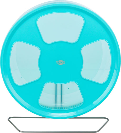 Ein großes, rundes, türkises Rad mit transparenten Einsätzen, montiert auf einem Metallgestell, "TRIXIE"-Logo sichtbar.