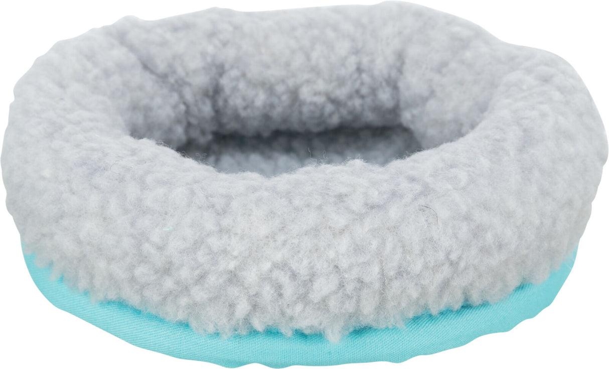 Rundes, flauschiges Bett in Hellgrau mit hellblauem Rand.