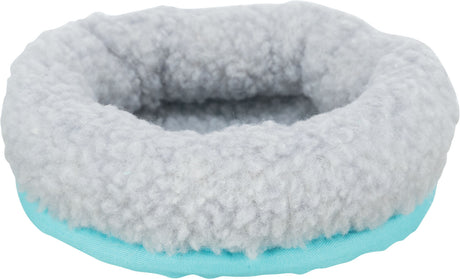 Rundes, flauschiges Bett in Hellgrau mit hellblauem Rand.