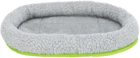 Ovale, graue, flauschige Unterlage mit grünem Rand, geeignet als Haustierbett.