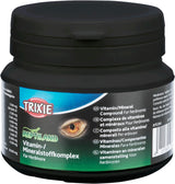 Runde schwarze Dose mit blauem Etikett, das "TRIXIE Reptiland Vitamin-/Mineralstoffkomplex für Herbivore" zeigt.