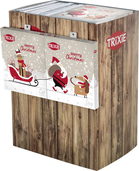 Holzoptik-Display mit Adventskalendern von Trixie, zeigt Weihnachtsmotive und die Aufschrift "Merry Christmas".