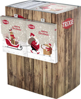 Holzoptik-Display mit Adventskalendern von Trixie, zeigt Weihnachtsmotive und die Aufschrift "Merry Christmas".