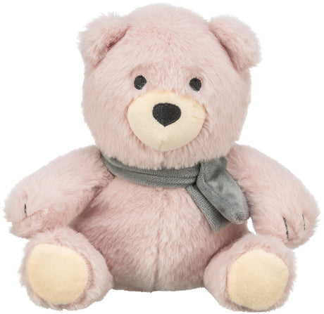 Rosa Plüschbär mit grauem Schal, sitzend und mit kleinen, runden Ohren und schwarzen Augen.