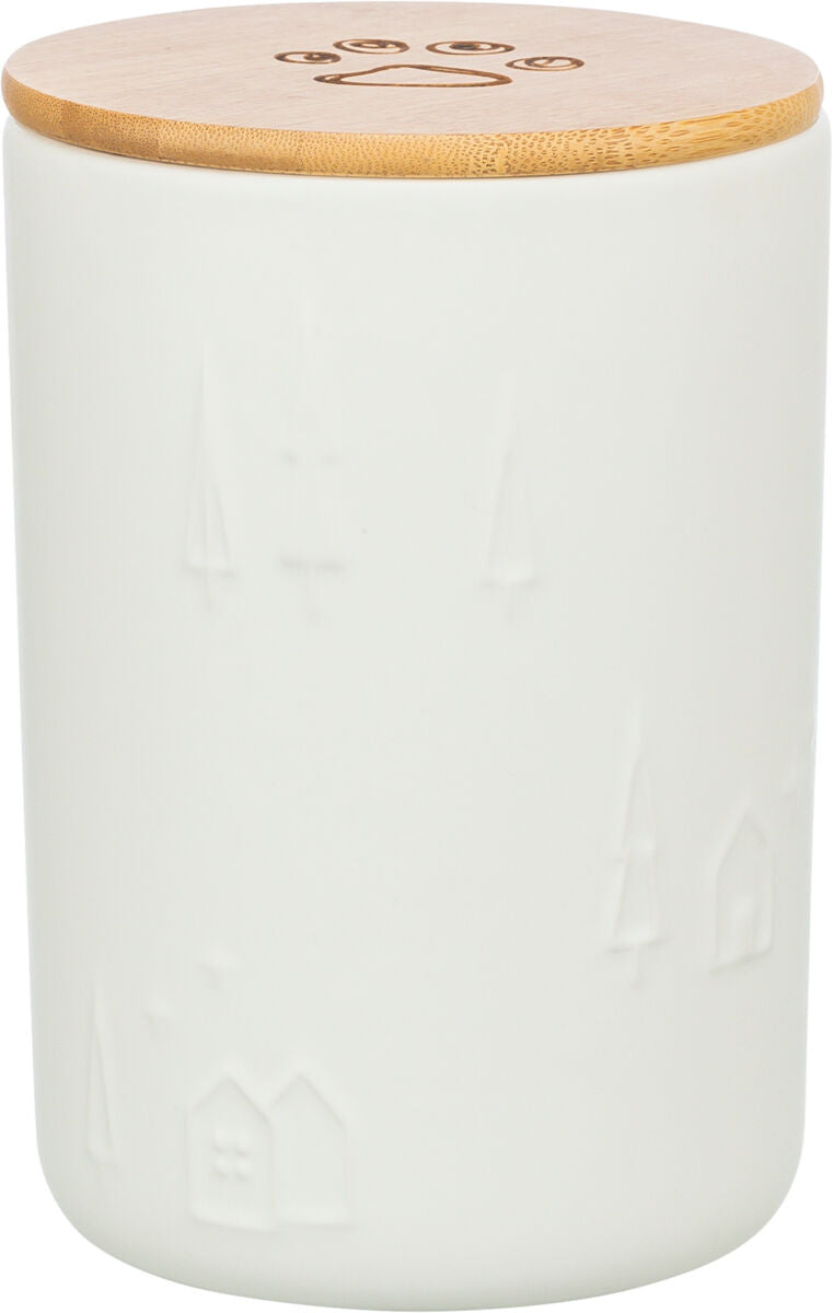 Weiße Vorratsdose mit geprägten Bäumen und Häusern, Bambusdeckel mit Pfotenabdruck-Motiv.