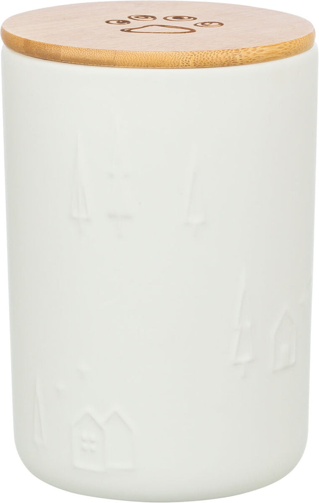 Weiße Vorratsdose mit geprägten Bäumen und Häusern, Bambusdeckel mit Pfotenabdruck-Motiv.