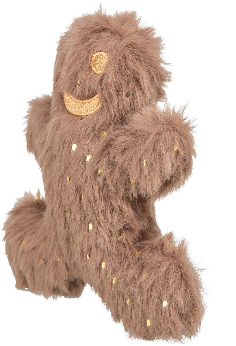 Plüschspielzeug in brauner Felloptik mit goldenen Punkten und gesticktem Gesicht, inklusive eines großen Lächelns.