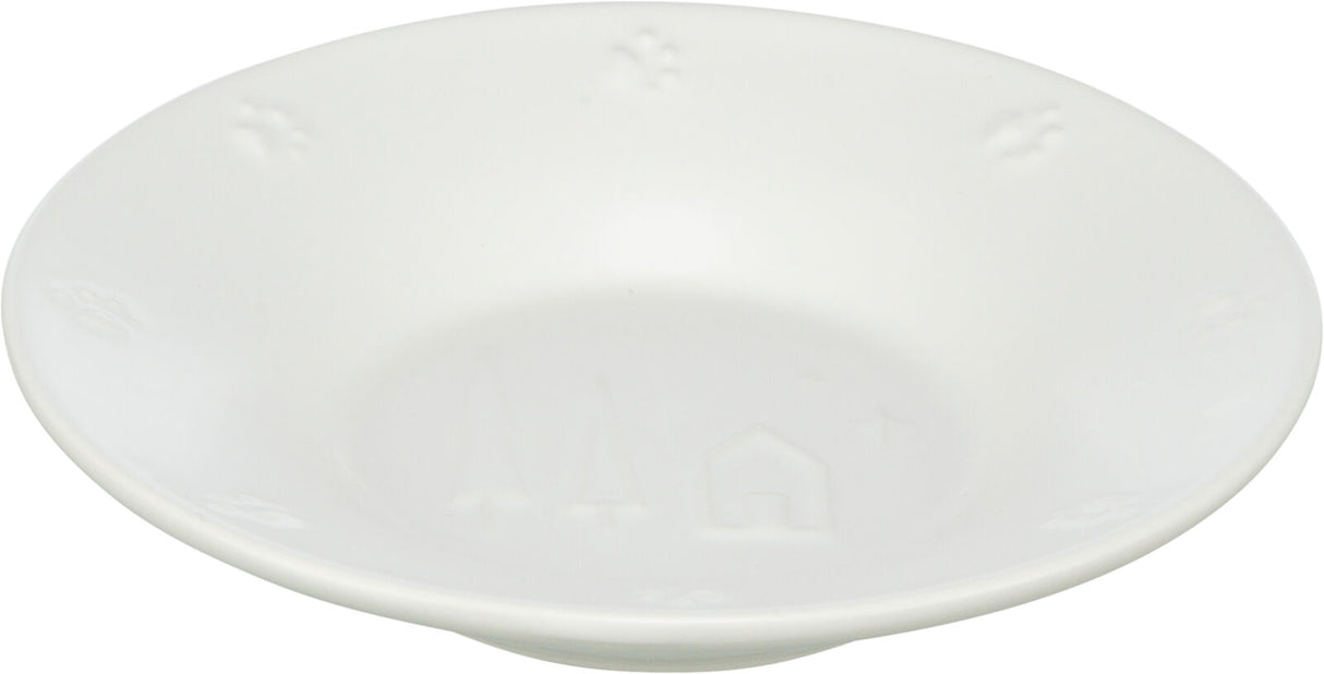 Weiße Schale mit geprägten Pfotenabdrücken und minimalen Motiven, glatte Oberfläche, rund geformt.