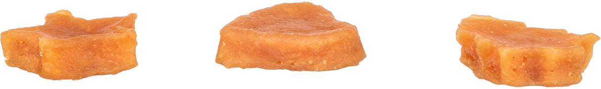 Drei orangefarbene, unregelmäßig geformte Objekte mit texturierter Oberfläche auf weißem Hintergrund.