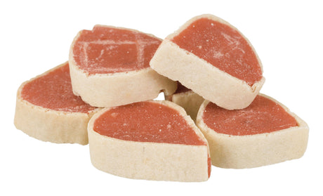 Mehrere beige und rote runde Objekte mit einer weichen Textur, die gestapelt sind.