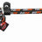 Bunte, grob geflochtene Leine in Schwarz, Weiß und Orange mit Metallschlaufe und Etikett.