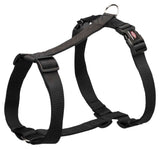 Schwarzes verstellbares Hundegeschirr aus Nylon mit Klickverschluss und Metallring.