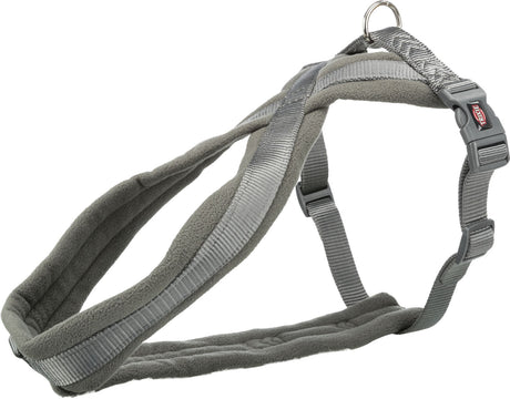 Graues Hundegeschirr mit gepolsterten Gurten und verstellbarem Verschluss, Metallring oben zur Befestigung.