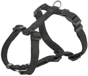 Ein schwarzes, verstellbares Hundegeschirr mit Schnallen und D-Ring aus robustem Material.