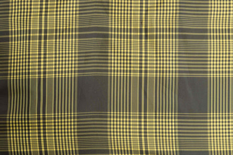 Karomuster mit wechselnden hellgelben und dunkelgrauen Streifen in einem geometrischen, sich wiederholenden Design.